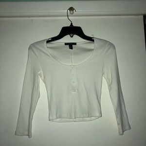 White cropped long sleeve top